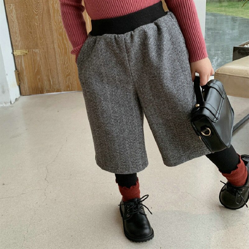 Spodnie dziecięce fałszywe dwuczęściowe wełniane oraz aksamitne grube spodnie 2020 zimowe ubrania nowe modne ubrania Gilrs w stylu brytyjskim