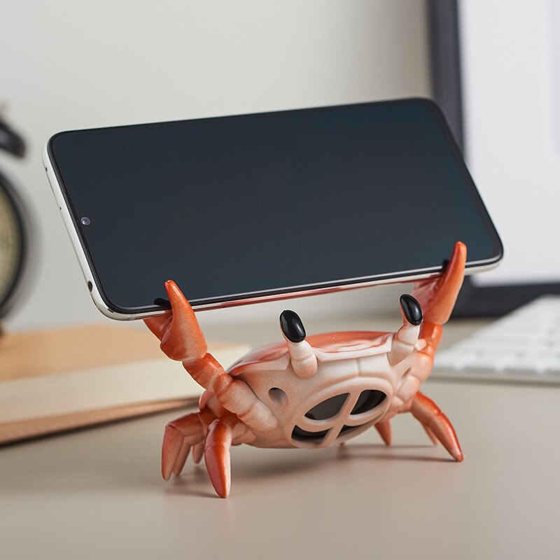 Krabbenförmiger kabelloser bluetooth-mini-lautsprecher mit handyhalterung, tragbarer surround-sound-knopf, audioelektronik