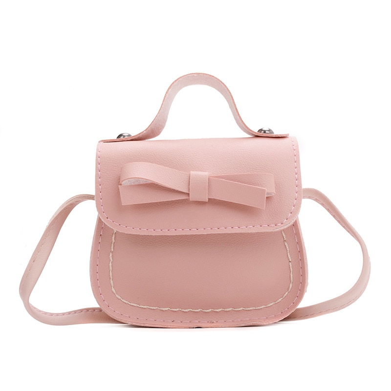 Neue Kleinkind Baby Messenger Taschen Kinder Kinder Mädchen Prinzessin Schulter Tasche Handtasche Solide Bowknot Prinzessin Münze Geldbörsen