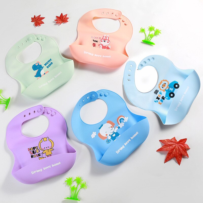 Niedliches Baby- #39 -lätzchen mit speicheltuch, wasserdichtem silikon, verstellbarem umfang, Karikatur-motiv und tasche