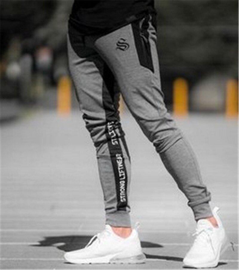 Heren workout joggingbroek heren gestreepte sport joggingbroek casual lange broek heren fitness joggingbroek bodybuilding hardloopbroek heren: Grijs / M