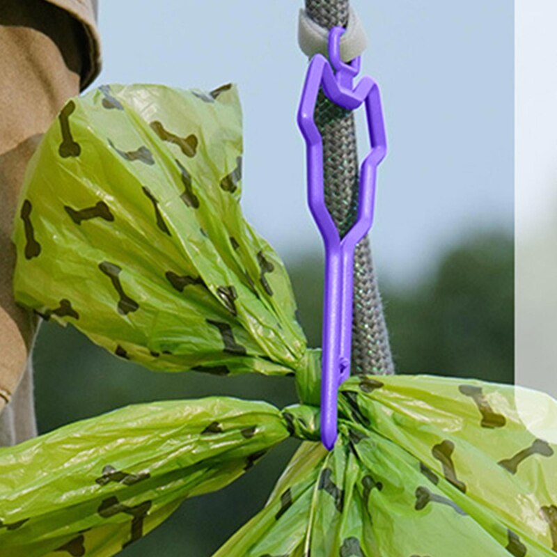 Correa para perros y mascotas, bolsa de gancho portátil de basura, Clip manos libres, soporte para Bolsa para popó de mascotas, suministros de herramientas de limpieza, 1 ud.