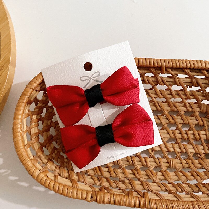 2 pçs gilrs bonito arco grampos de cabelo sólido cor pura rosa vermelho preto arco grampos de cabelo para meninas do bebê estilo coreano miúdo acessórios de cabelo: 2pcs red
