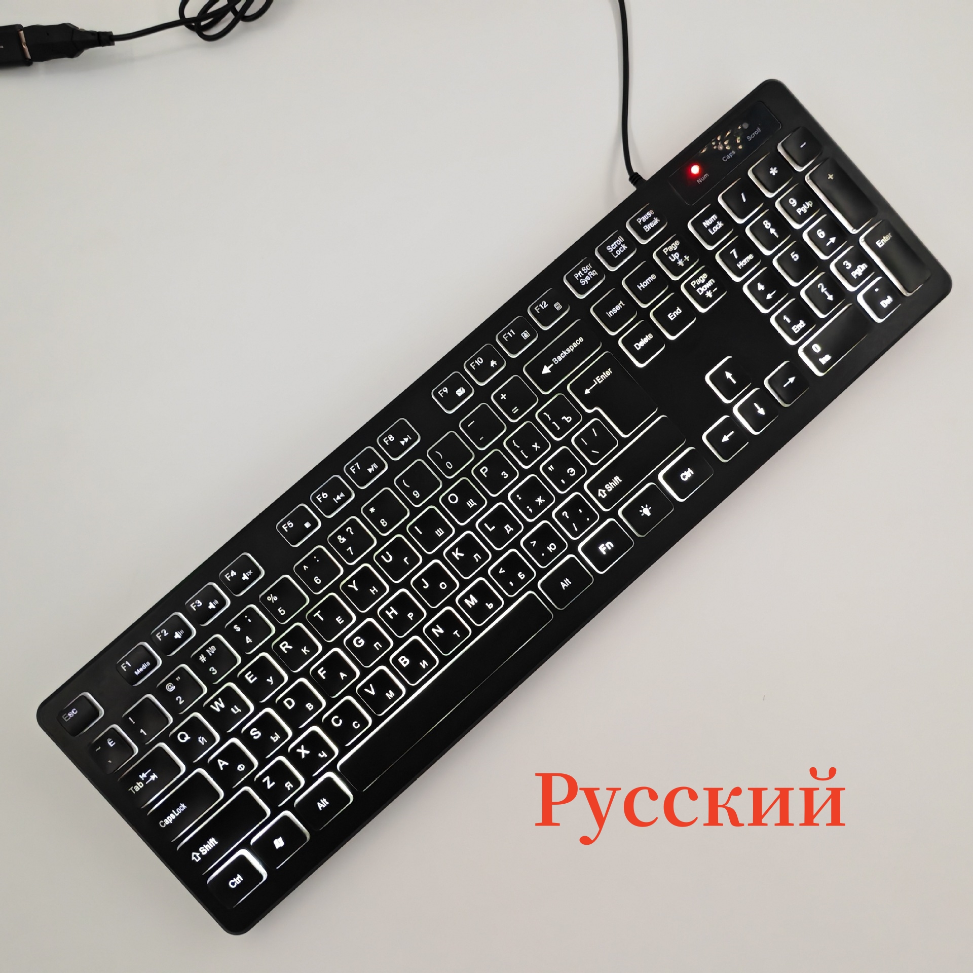 Teclado en español con la Ñ Teclado ruso, árabe, francés, alemán, inglés Ratón 100 % Retroiluminación arcoíris Letras translúcidas ISO 105 teclas Teclas de acceso directo multimedia W66