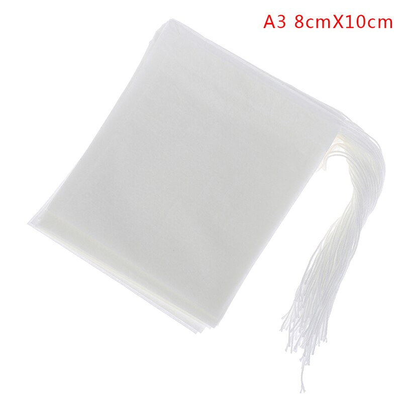 100 st / parti pappers tepåsar filtrerar tomma tesäckar med dragsko för ört löst te: A3