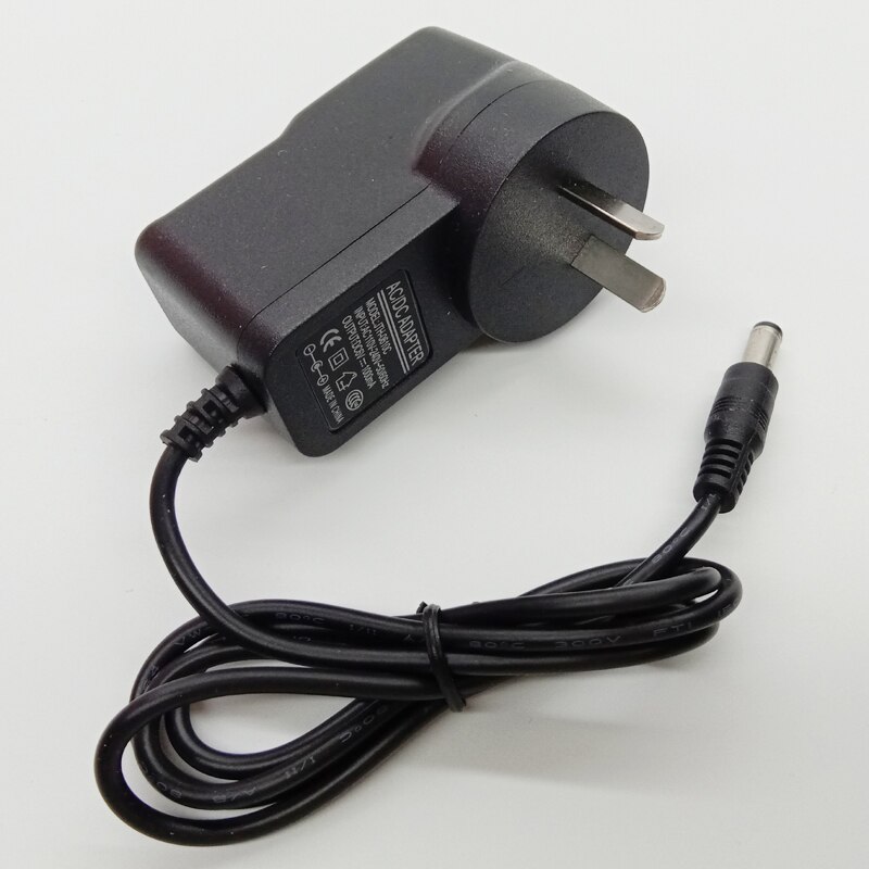 Paras universaali  ac 100-240v us eu uk au pistoke  dc 12v 600ma virtalähdesovitin 5.5mm*2.5mm yleisvirtasovitin