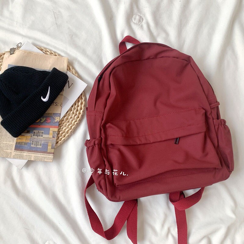 Ryggsäckar kvinnor nylon vattentäta fritidsstudenter harajuku solid dragkedja trend ins all-match mochila stor kapacitet ulzzang: Röd