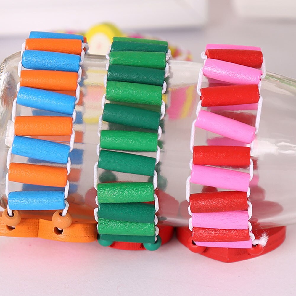 1 pc Nuovo colore Casuale Delle Ragazze Dei Ragazzi dei bambini del fumetto di simulazione di trasporto di legno della vigilanza Studente di Cancelleria Regali di Artigianato Della Vigilanza Del Braccialetto Giocattoli