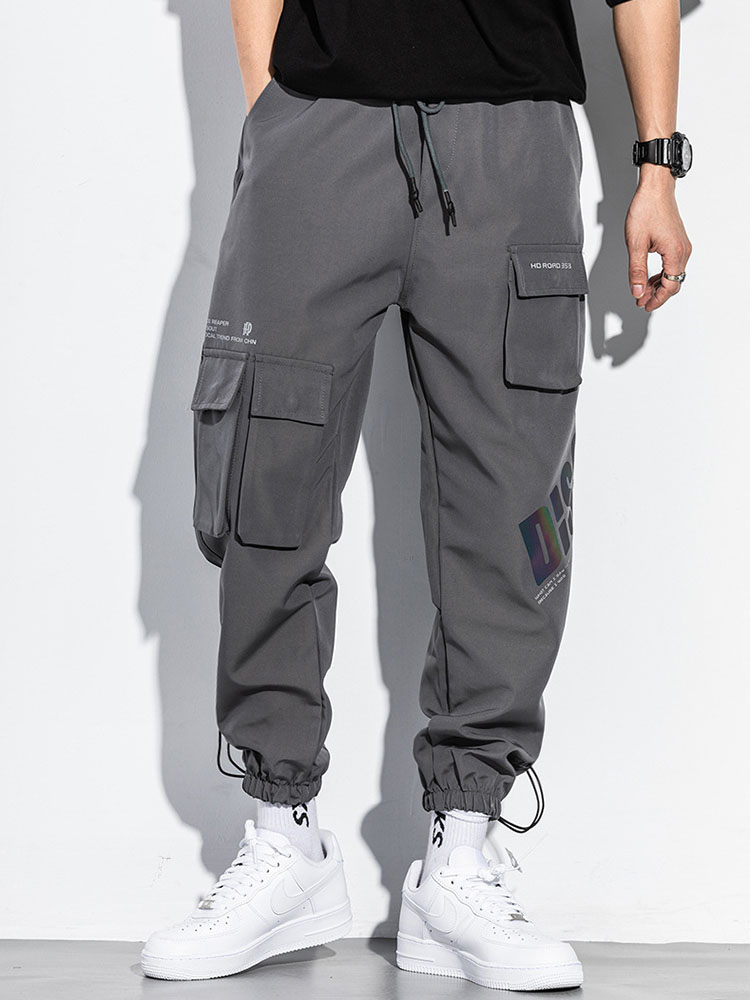 Techwear riflettente uomo Streetwear pantaloni Hip-Hop coreani Harem pantaloni Cargo Casual da uomo pantaloni larghi funzionali multi-tasca