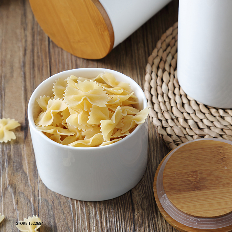 Recipiente de porcelana para el hogar, tarro de cerámica para almacenamiento de alimentos, contenedor autosellante, tapa de bambú hermética, tres tamaños para elegir