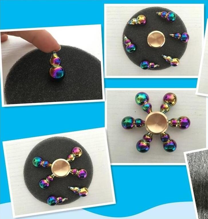 Spinner de mano para reducir el autismo, juguete Antiestrés con caja de , arcoíris, seis brazos, TDAH