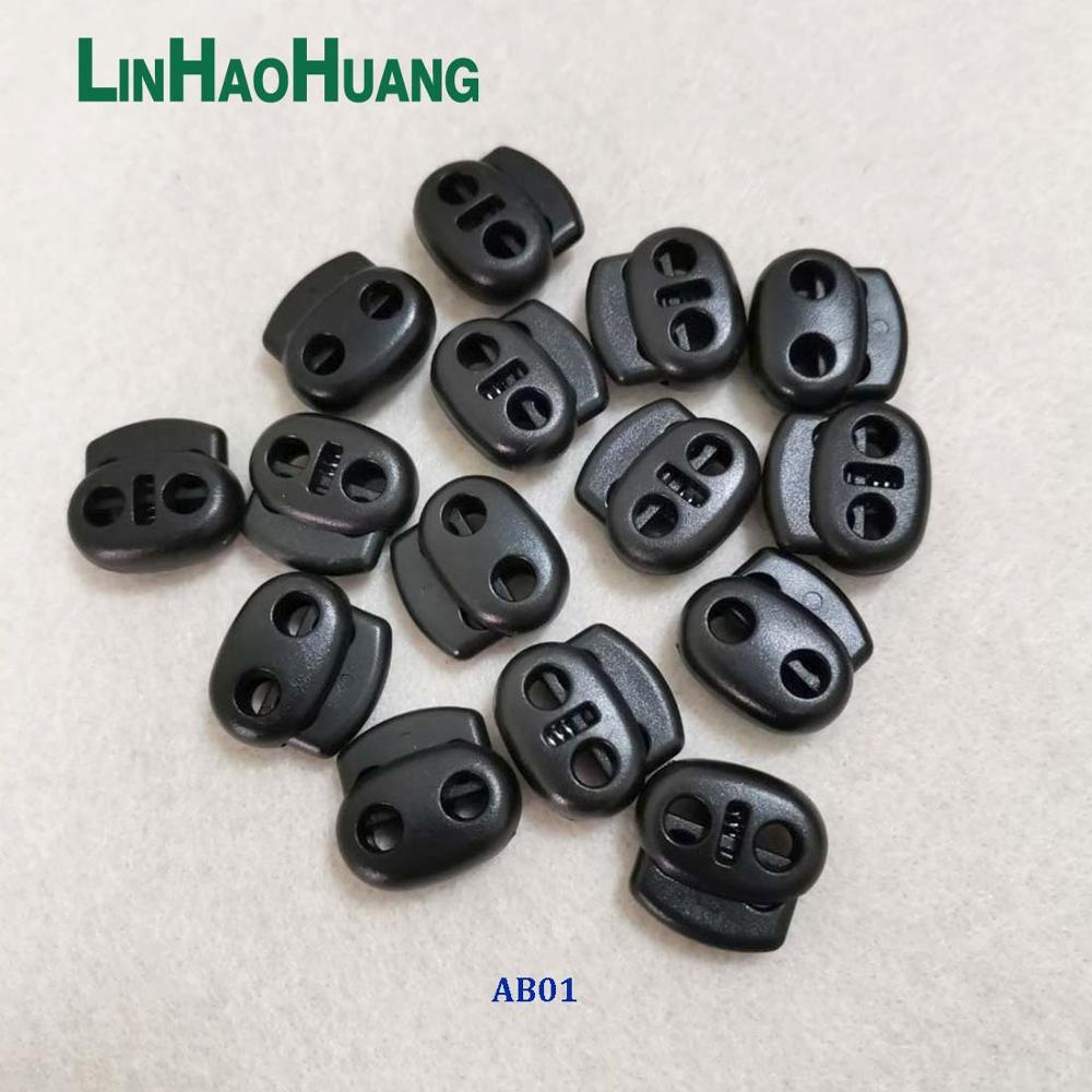 100 stk/lot svart pom plast kule ledning lås veksler plast 2 hull fjær stoppere 4mm strikk sjokk ledning