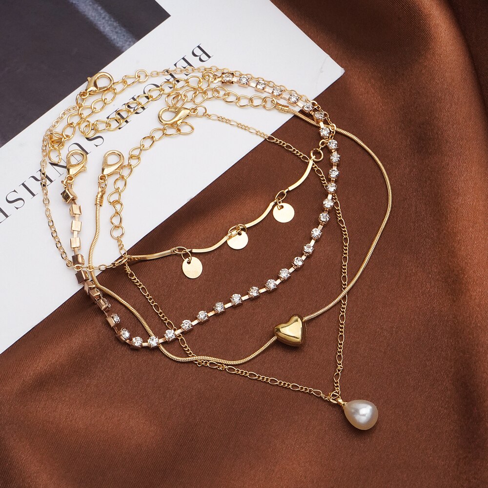 EN – Bracelet de cheville rétro pour femmes, ensemble de 4 pièces, goutte d'eau, perle, cœur, paillettes, style bohème, bijoux de plage, à la