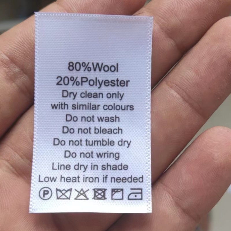 100 st vita tvättrådsetiketter för bomull/siden/kashmere/ull/linne/polyester/elastan med tryck av satintyg: Svart