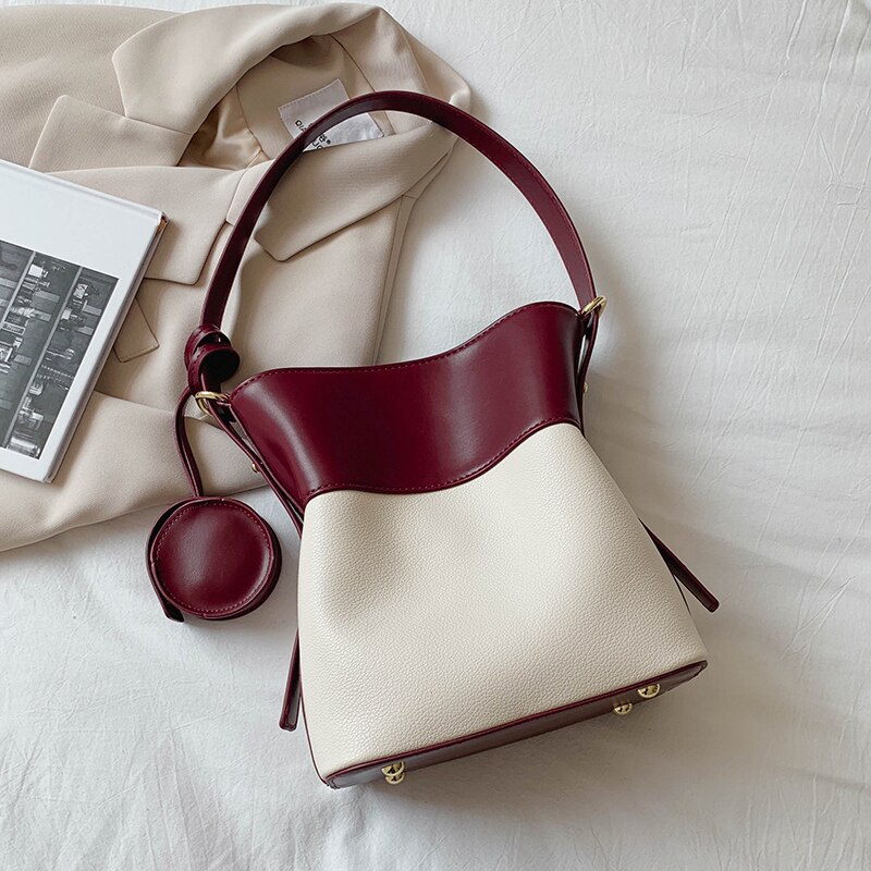 Kontrastfarve små pu læder spandposer til kvinder vintage mærkevarer crossbody håndtasker kvinders trend håndtasker