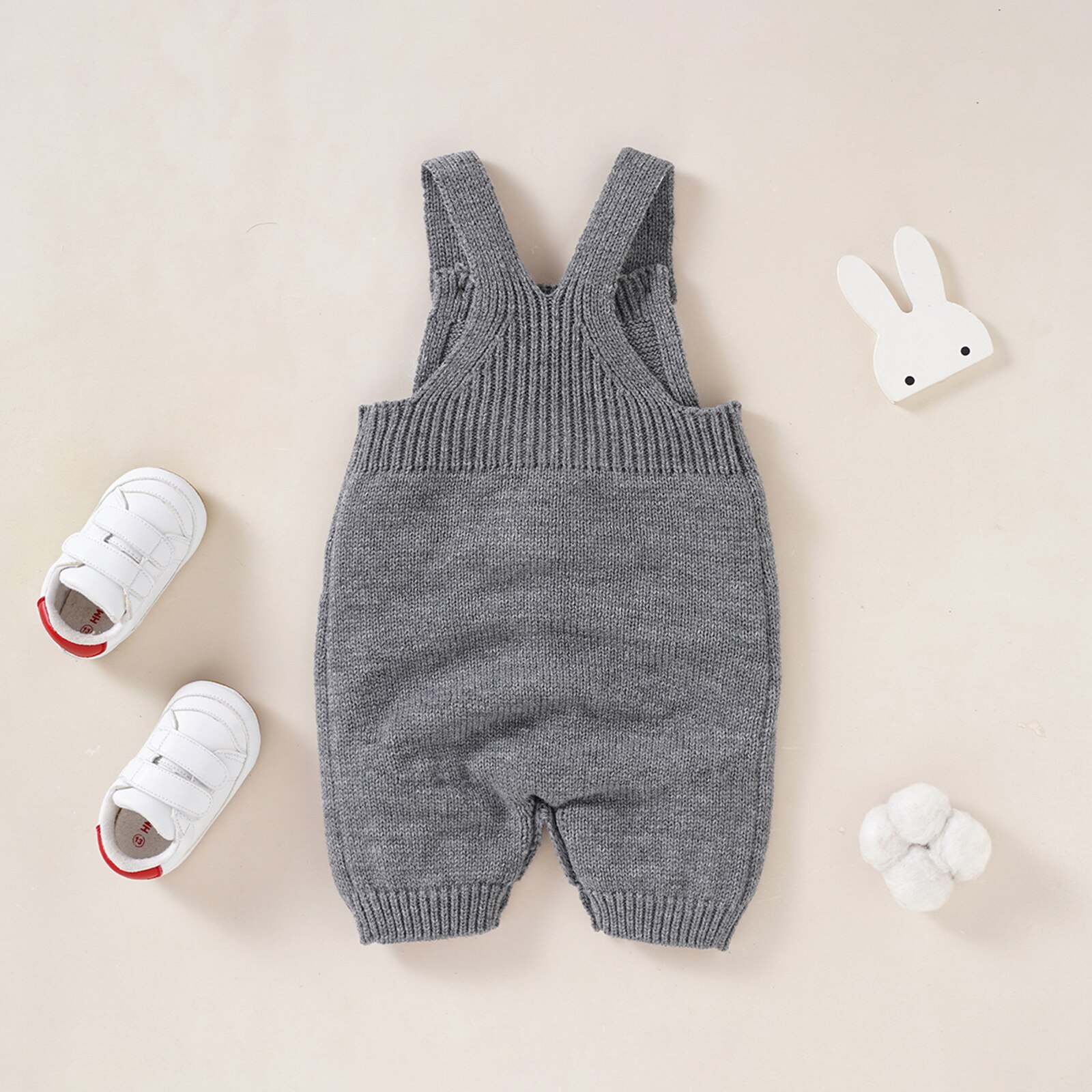 Oster-strickoverall für babys und kleinkinder, ärmellos, mit hasenmuster und vordertasche