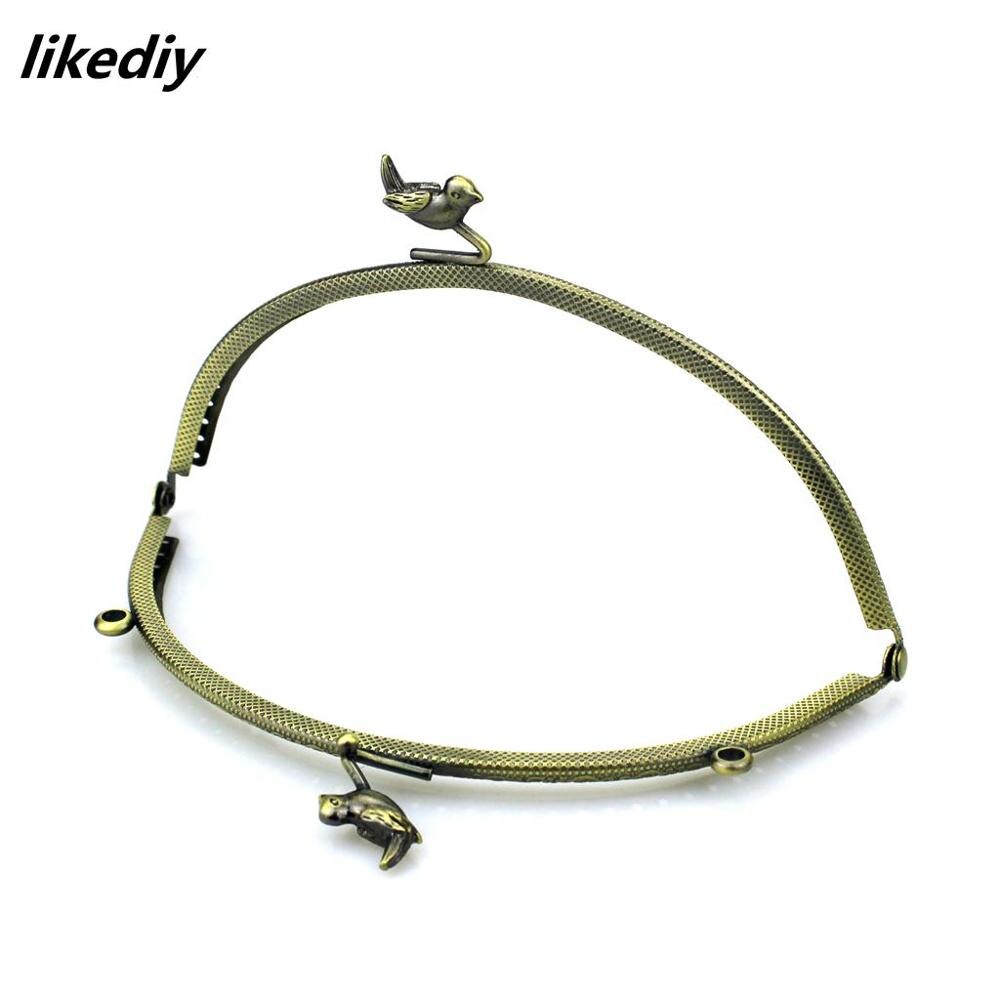 1 stycke 15.5 cm antik brons halvcirkel tecknad fågelpärla metall handväska ram prägling kyss spänne diy väska tillbehör