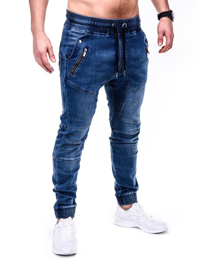 Höstens europeiska och amerikanska tvättade denimtyg för män sportbyxor och benvärmande jeans