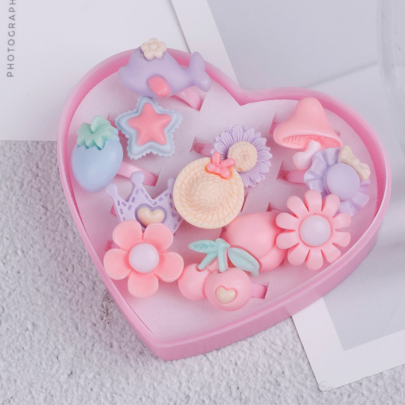 12 st / lot söt tecknad blomma diverse harts plast rosa baby barn flicka barnringar med hjärta låda smycken hantverk leksak