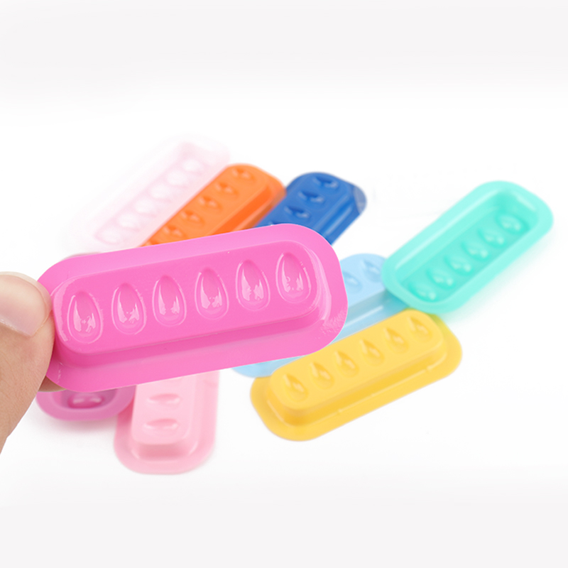 100 pièces porte-colle à cils Palette Extension de cils support adhésif tampons bande en forme de joint en plastique Palette cils artiste accessoires