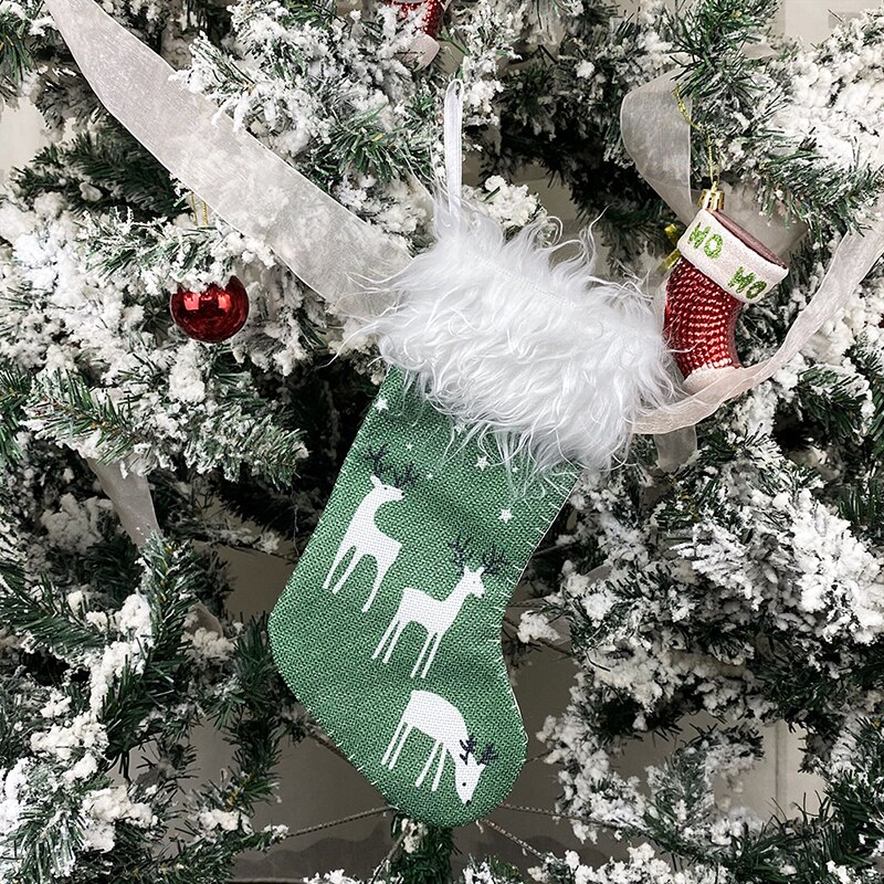 Juledekoration julestrømper ornamenter vedhæng små støvler børn år slikpose trædekorationer
