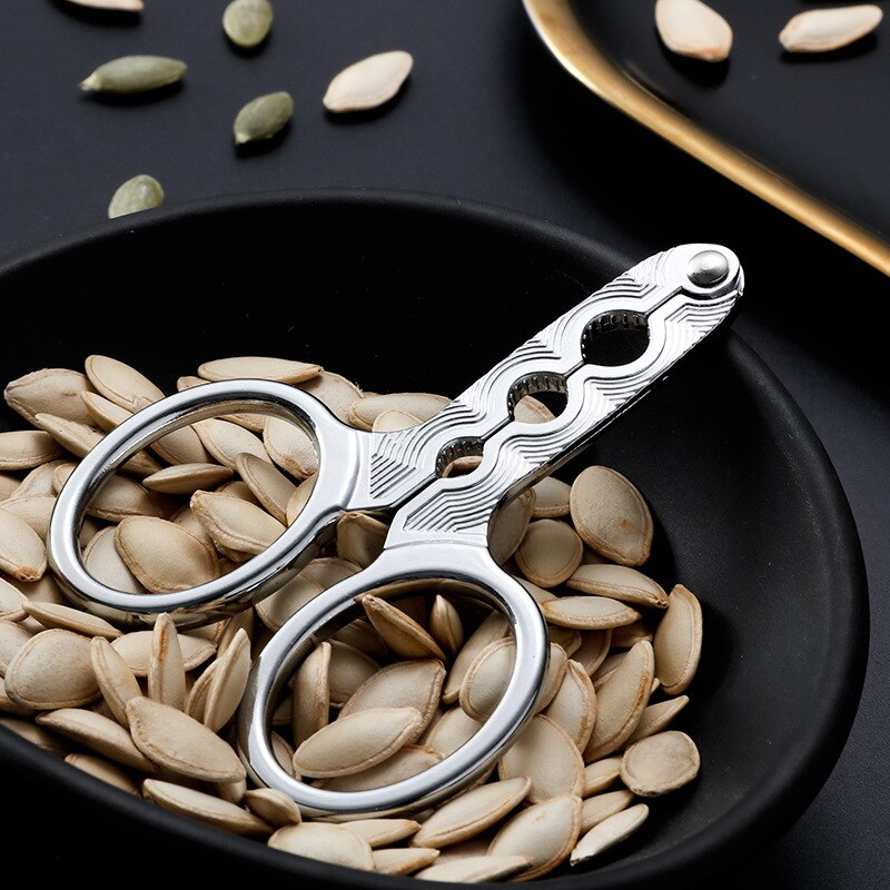 Melon frön skal kökstillbehör köksredskap rostfritt stål nötknäckare multifunktion valnöt furu skalöppnare
