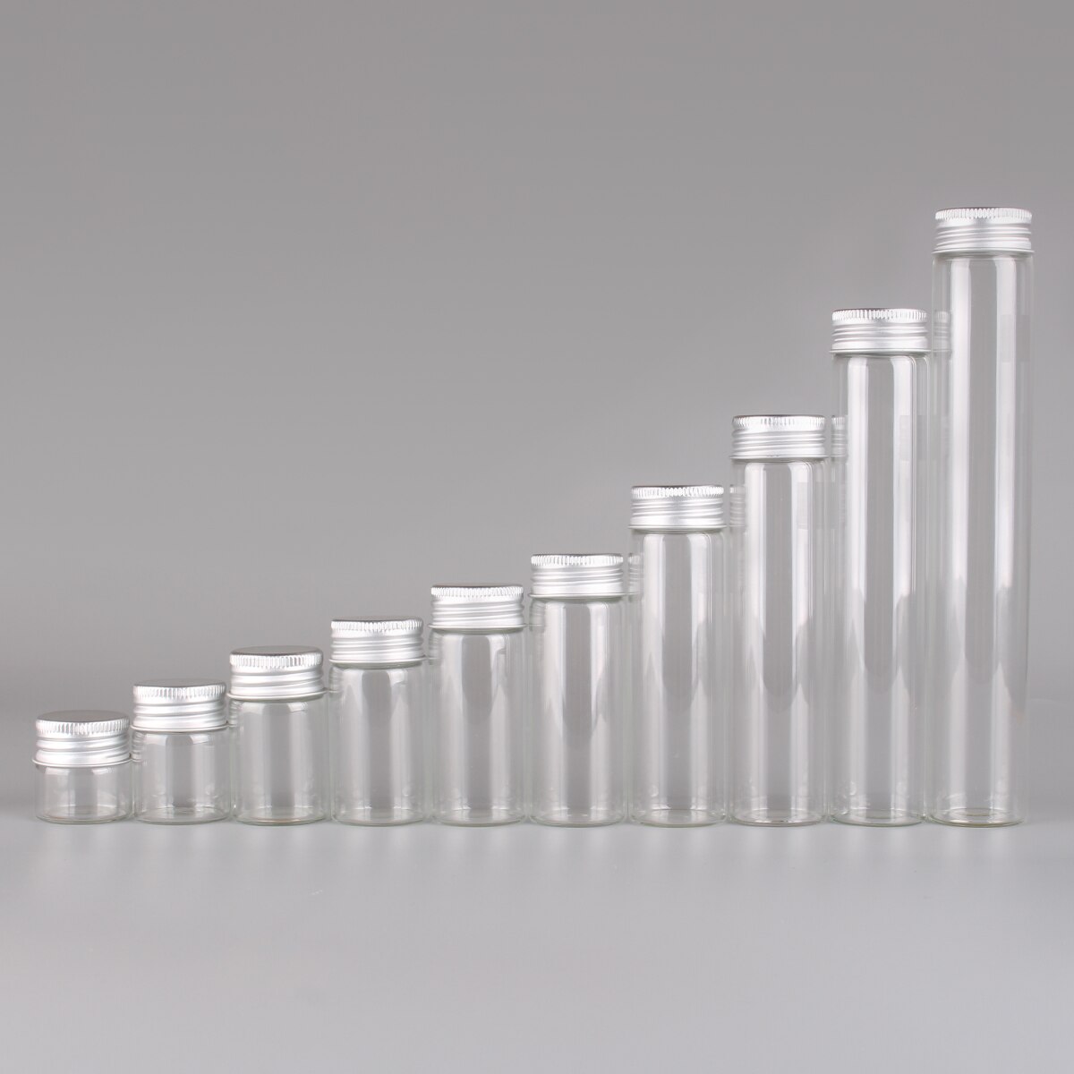 12 Uds 10ml 15ml 20ml 25ml 30ml 40ml 50ml 60ml 80ml 100ml botellas de vidrio con tapas de aluminio botella de especias de vidrio vacía para manualidades