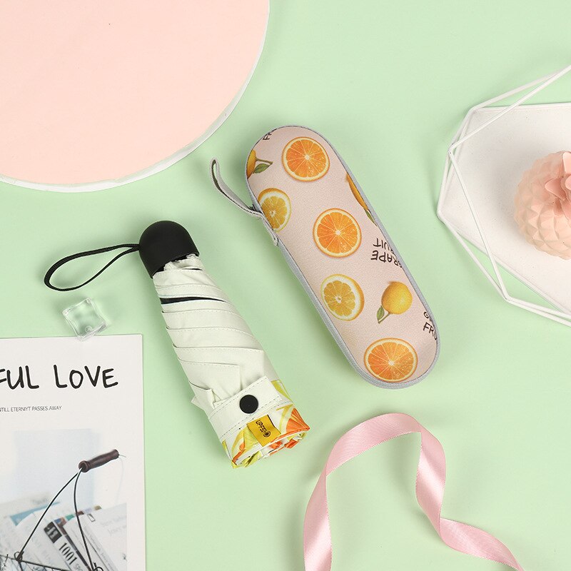 Mini paraguas plegable con forma de cápsula para mujer, sombrilla de protección solar Anti-UV UPF50, sombrilla plegable para mujer: grapefruit
