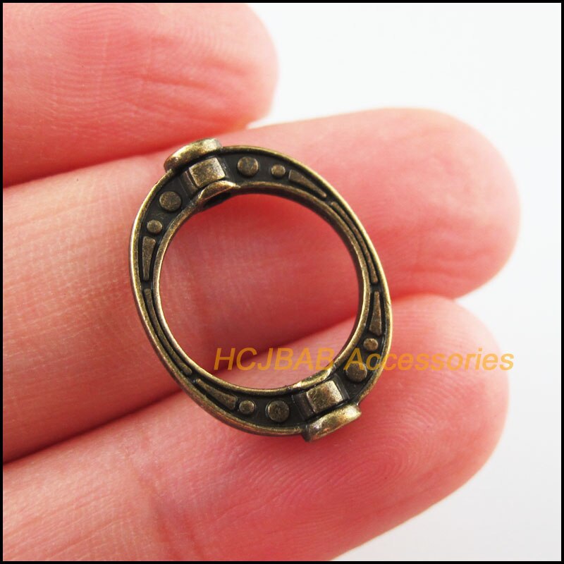30 cuentas espaciadoras de marco ovalado chapadas en plata tibetana, oro envejecido y bronce, 14,5x19,5mm: CAMEL
