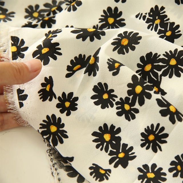 Kesämekko materiaali päivänkakkara kukka sideharso mekkokangas aurinkovoidepaita