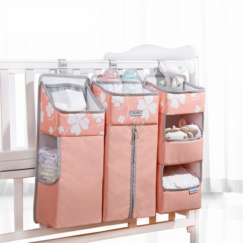 Sunveno Crib Organizer for Baby Crib Hanging Storage Bag Baby Clothing Caddy Organizer for Essentials Bedding Diaper Nappy Bag: Clover pink L