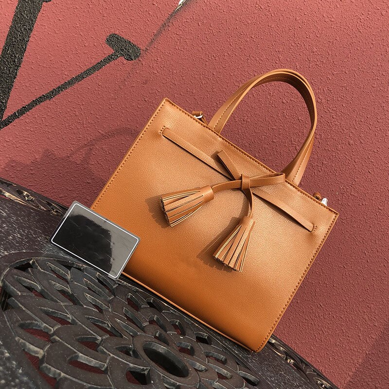 Gaohe europeu e americano bolsa de comércio exterior bolsa feminina outono e inverno nova fronteira bolsa borla arco pequeno quadrado ba