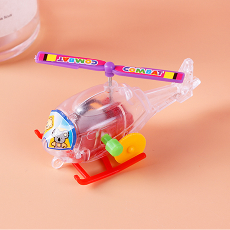 Og interessant wind-up urværk legetøj gennemsigtig mini flyvemaskine helikopter pull-back legetøj barn spædbarn gennemsøgning legetøj
