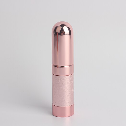 1 stk metal kugle parfume underflaske kosmetisk sprayflaske let bærbar læbestift form skridsikkert mønster tom flaske: Lyserød