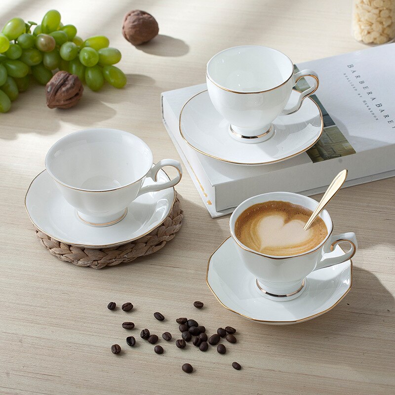 Style européen supérieur ivoire blanc en céramique os chine porcelaine Drinkware service à café avec soucoupe tasse et cuillère Rose doré