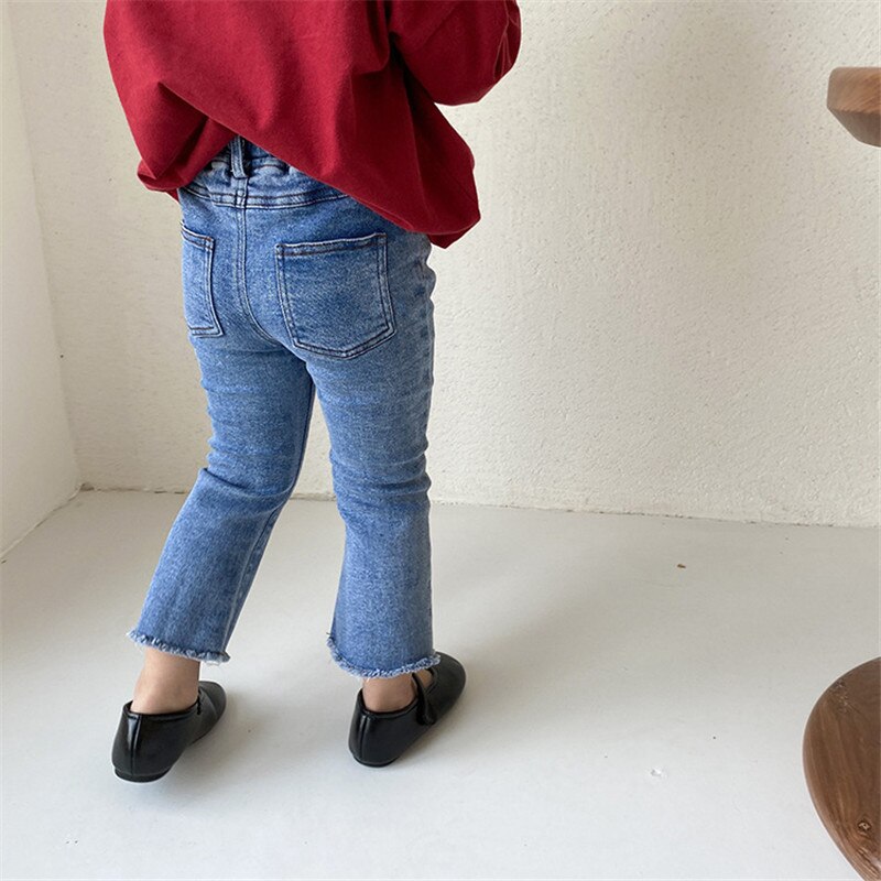 Herfst schattige meisjes elastische franjes uitlopende broek 1-7 jaar kinderen effen kleur denim broek meisje katoenen casual all-match jeans