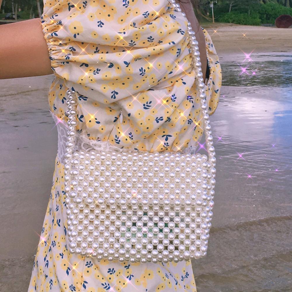 Pure handmade pearl bag exquisite shoulder bag retro Beaded female mobile phone bag armpit bag horizontal bag