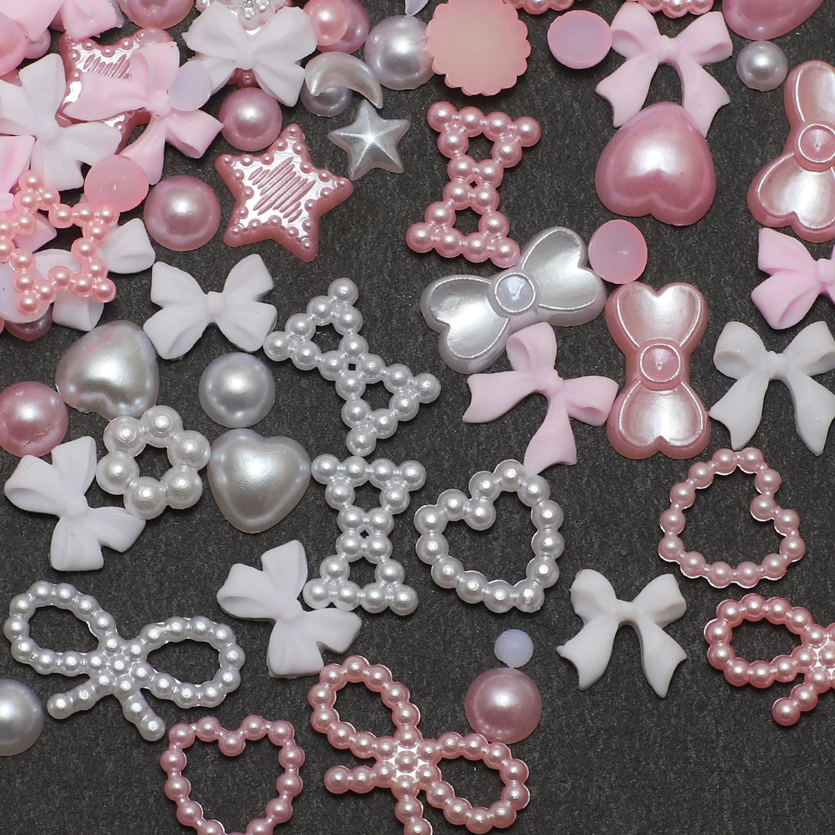 1 doos nagelaccessoires 3D nagelbedel hars liefde boog pentagram nagelaccessoires gemengd roze witte hars holle parel voor manicure