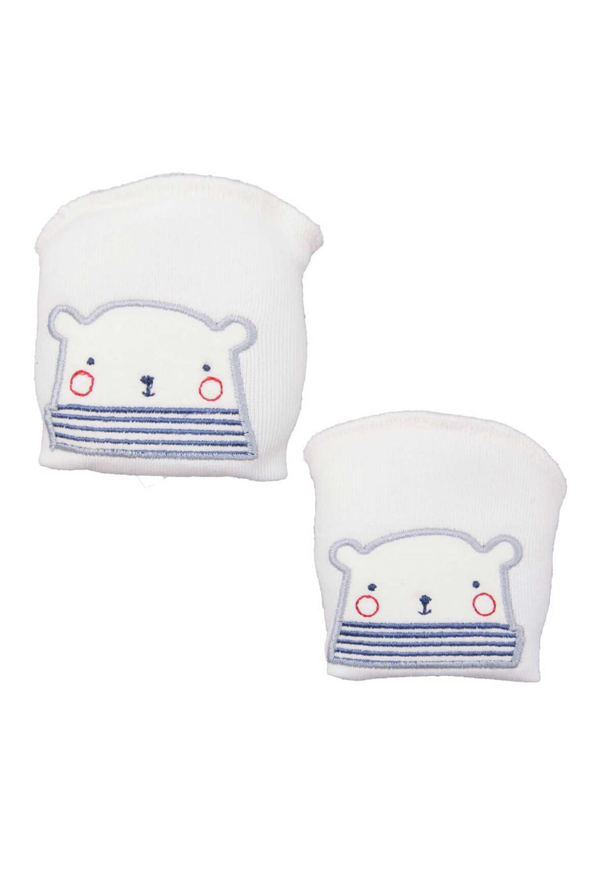 Bébé fille blanche crue rampant les genouillères