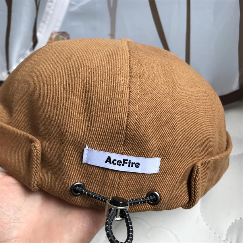Kiinteä kiristysnyöri pipo reunaton lippalakki vintage retro leon satama satamalaituri hattu rullattu ranneke kallo merimies pyöräilijä lippikset kesä ulkona