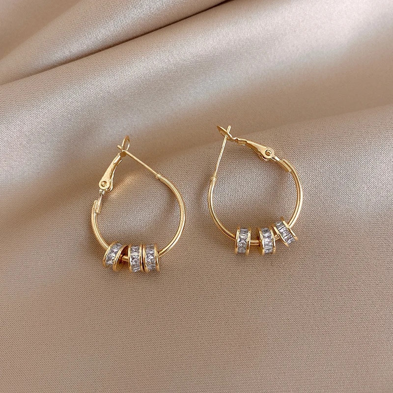 Pendientes giratorios chapados en oro Real para mujer, joyería de coreana, cuentas de circón redondas, accesorios de de graduación de lujo: Caqui oscuro