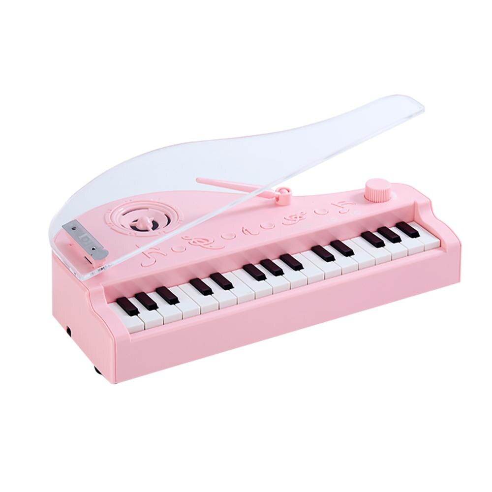 Mini klaver intelligent induktion 7 farve belysning 31 nøgle bluetooth musik legetøj til børn bedste jul: Lyserød