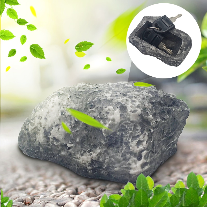 Ulkona puutarhan turva -avain rock -laatikko piilotettu piiloutumaan kiven turvallisuuteen turvallinen varastointi piilossa