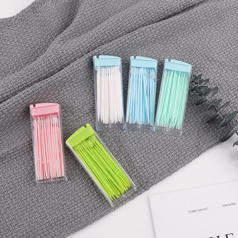 Palillos de dientes de plástico de dos cabezas, palitos de hilo dental desechables de Color aleatorio, herramientas de limpieza respetuosas con el medio ambiente, accesorios de viaje, 50 Uds.