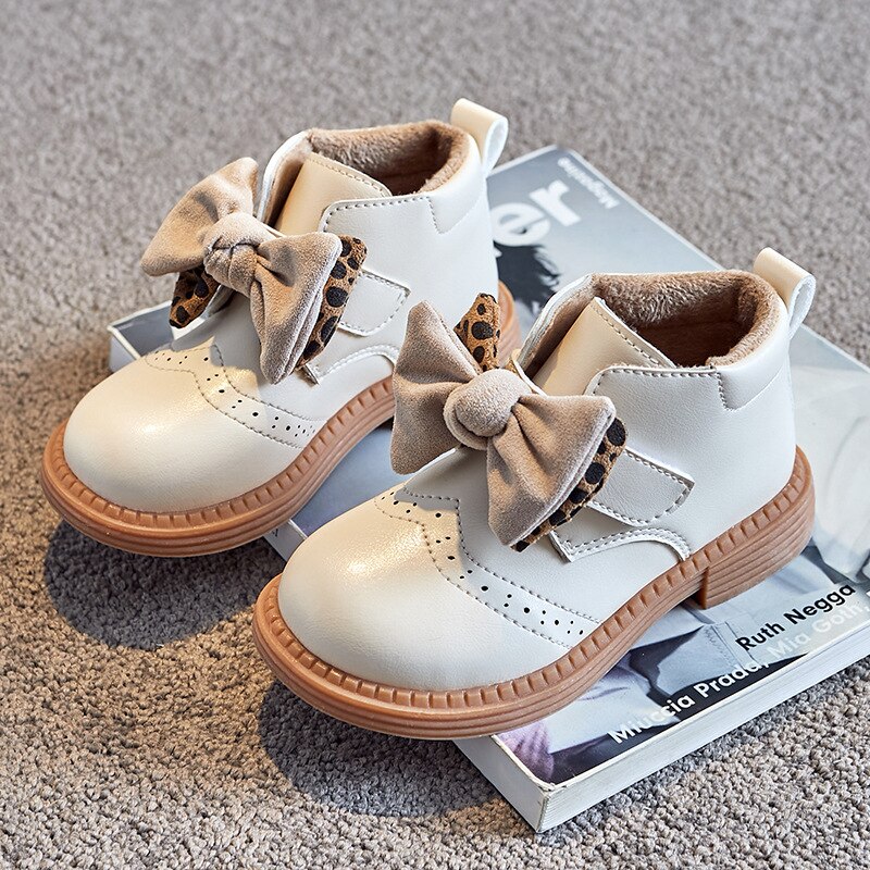 Stivali da bambina Martin primavera Solid Hollow carino con fiocco Leopard PU stivali da scuola principessa novità stivaletti Hook &amp; Loop scarpe da principessa