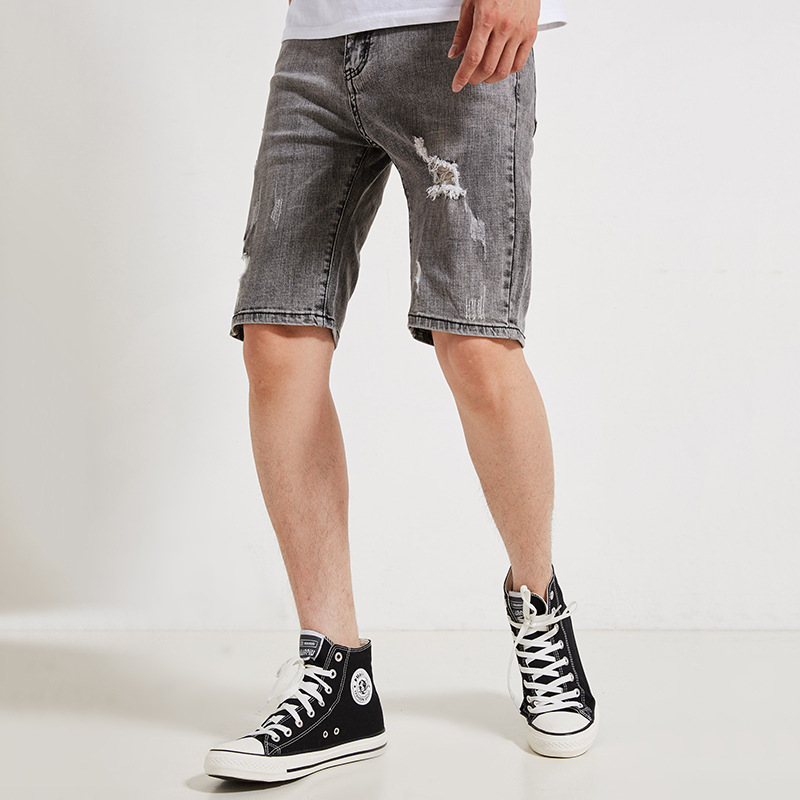 Pantalones cortos de mezclilla para hombre nuevos pantalones cortos de cinco puntos coreanos casuales de tiro medio sueltos elásticos rizados tamaño 28-35 36