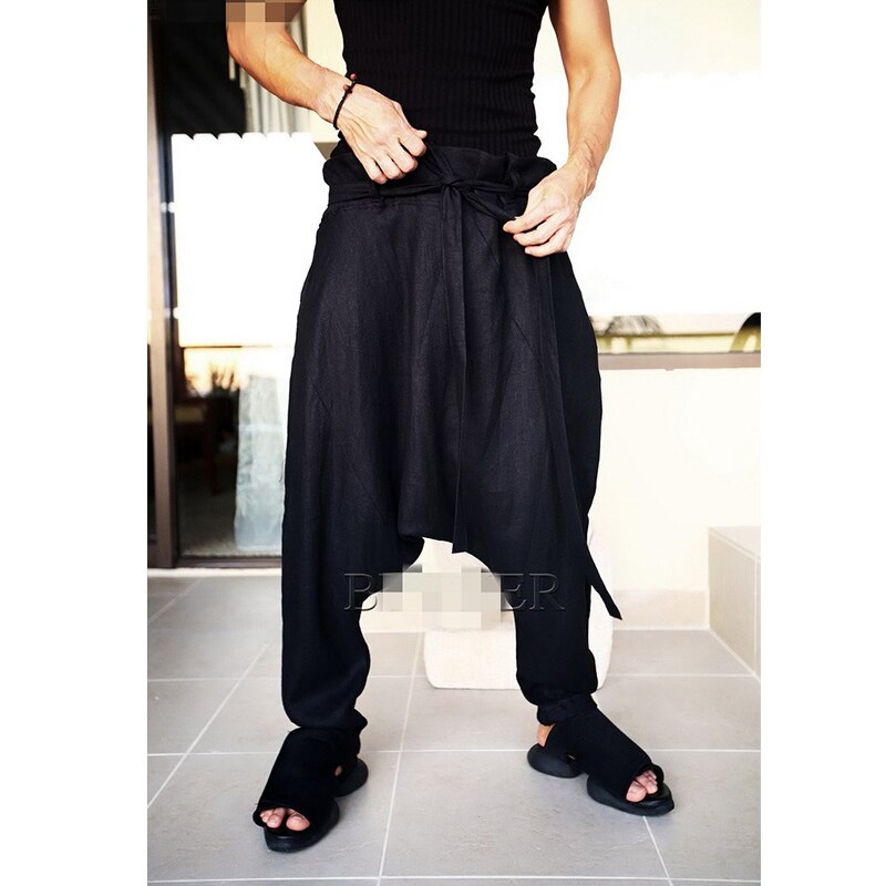 Juventude coreana hip hop masculina baixa virilha moda tendência rendas até calças casuais harem calças de linho calças soltas personalidade