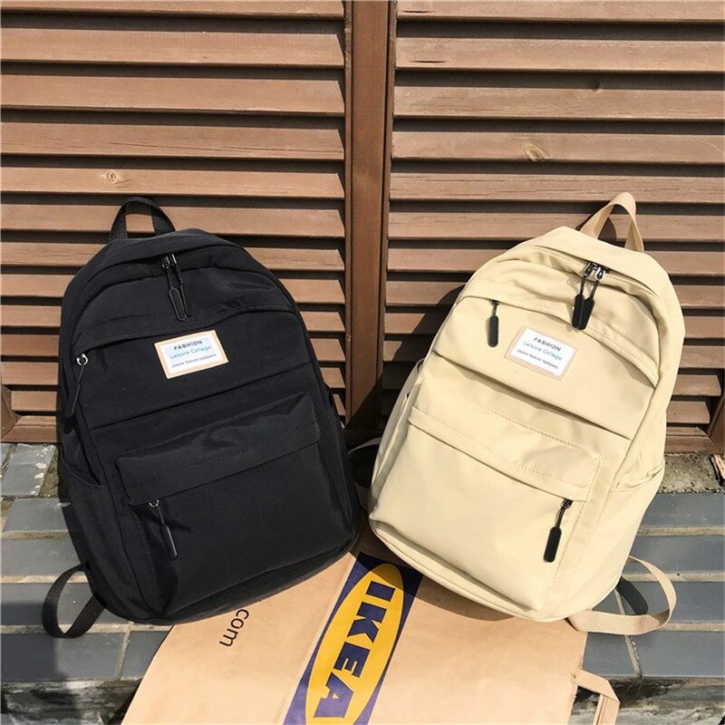 Solid rosa ryggsäck märke unisex fritid eller resväska stor kapacitet färsk skolväska för tonårsflickor över natten