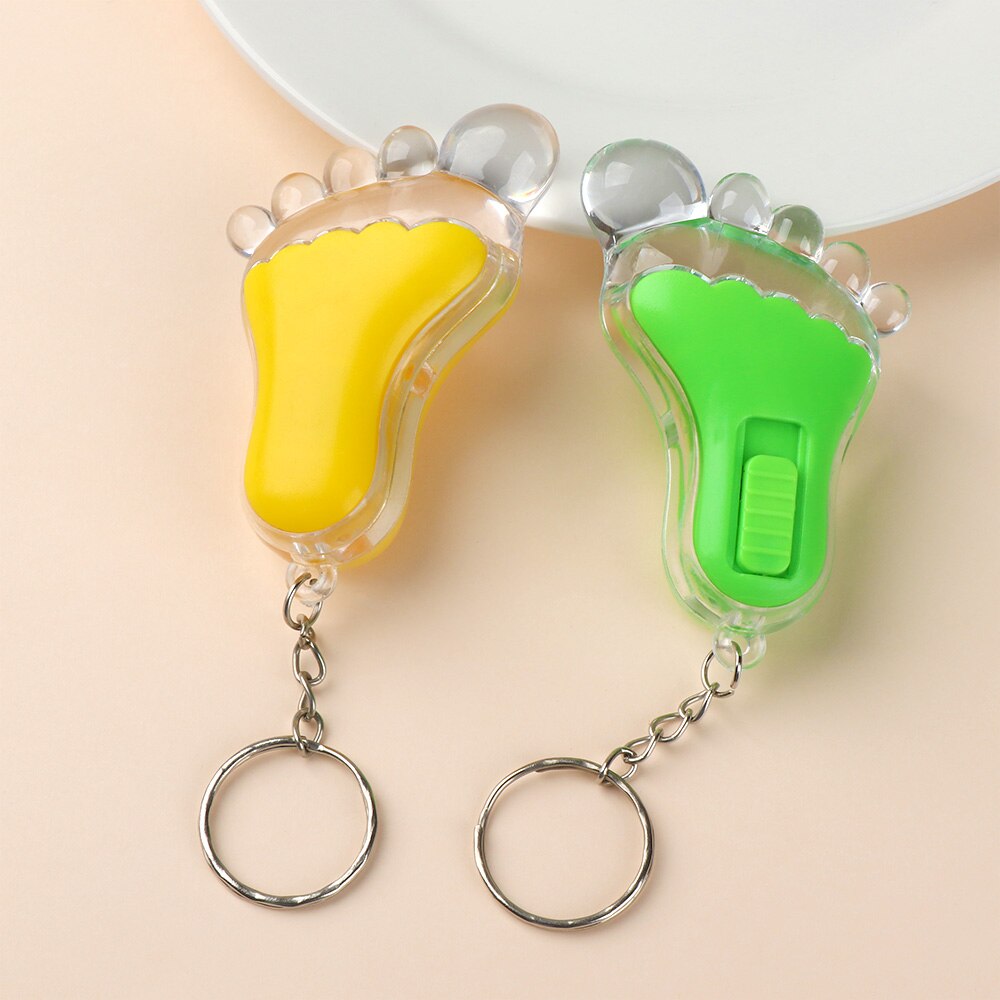 Super Helle Zufällige Farbe Neue Taschenlampe Kunststoff Kleine Füße Heißer Led Lampe Schlüsselanhänger Glanz Kreative Footed Keychain Kleines Spielzeug