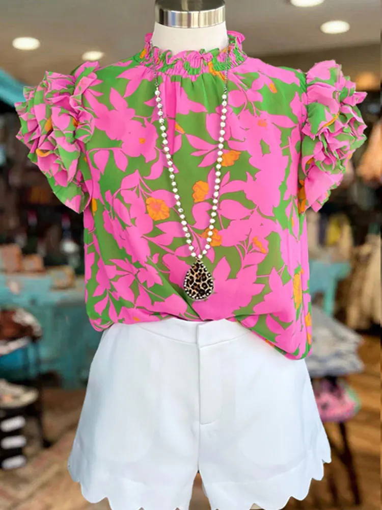 Bluse med flæser og bladprint og lagdelt top